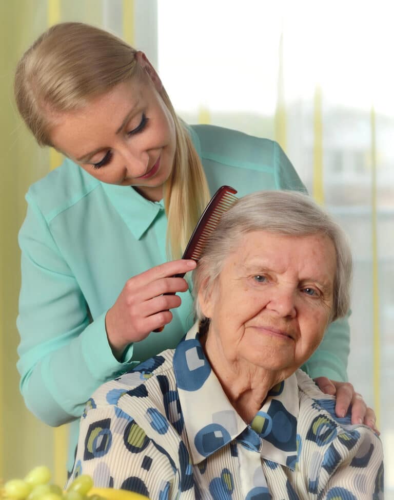 Senior enjoying meaningful companionship with a caregiver in South County home care setting