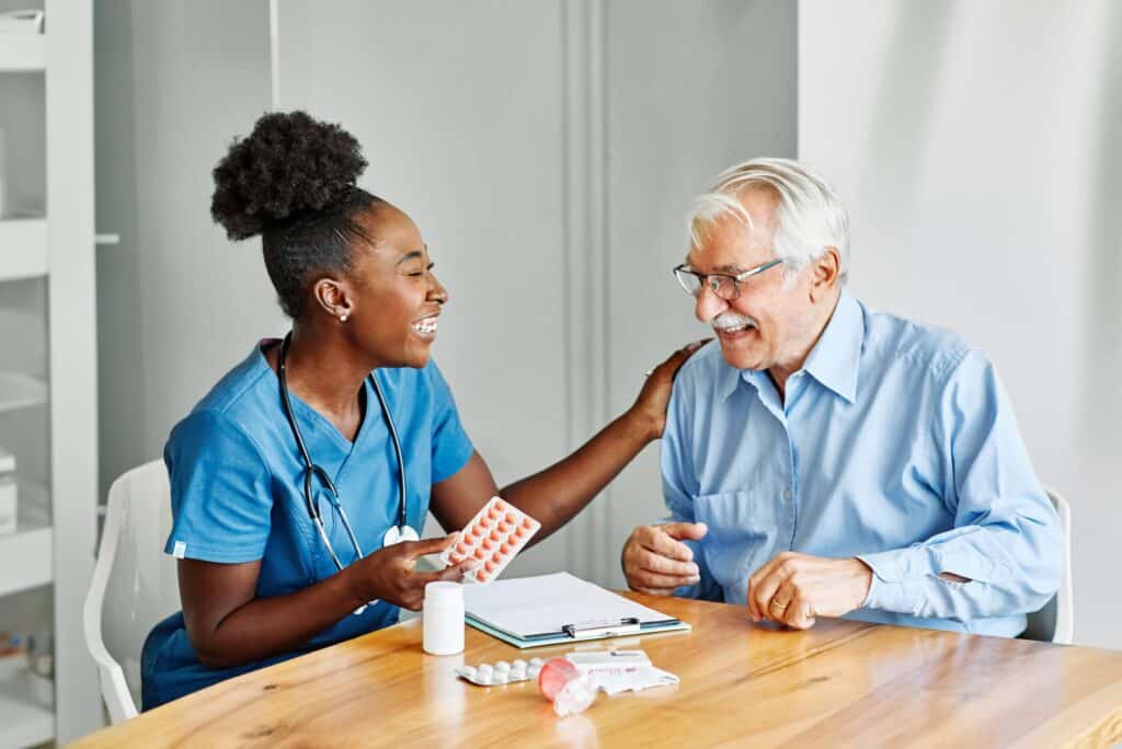 Compassionate caregiver helping a senior with personal care at home in San Diego, CA, ensuring comfort and dignity.