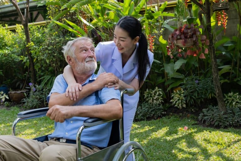 Chula Vista senior home care – A compassionate caregiver assisting an elderly client with daily tasks, providing companionship, and supporting their independence at home.